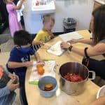 Kindgarten students prepare their class snack each day