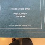 Scorebook from 1967 for Eastern Mennonite College and High School boys soccer matches. Includes stats for EMC vs UVA match.