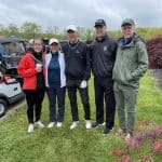 sha Beck (with sponsor Gaines Group Architects), Susan Landes '90 Beck, David Landes '79, Phil Landes '81 and John Landes '77.Dad Roland joined for the second nine holes.