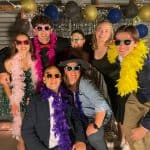 SCO fall formal, 2022. Luke Rogers, SCO president, back left with dark pink boa