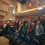 Students sing during chapel in 2024