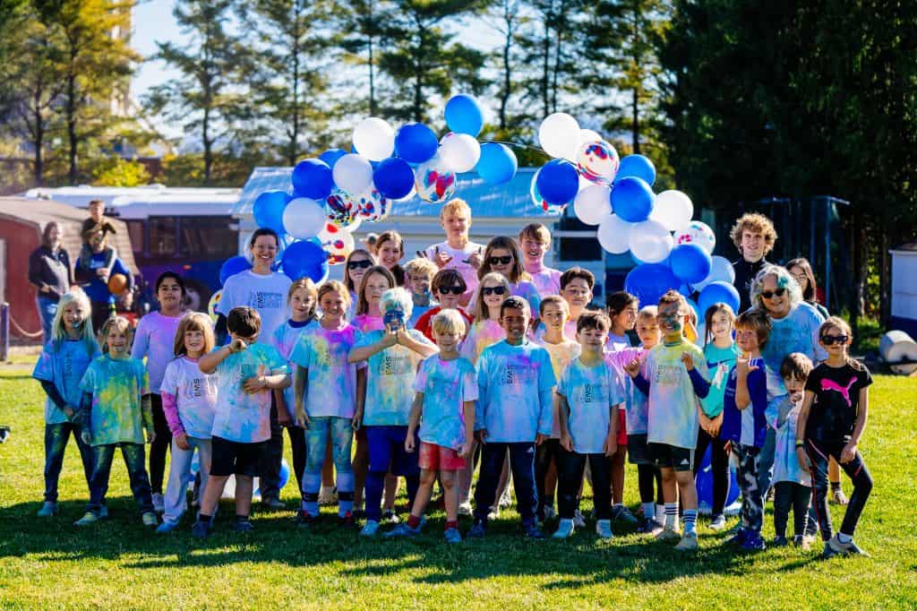 Students covered in colored chalk after their run!