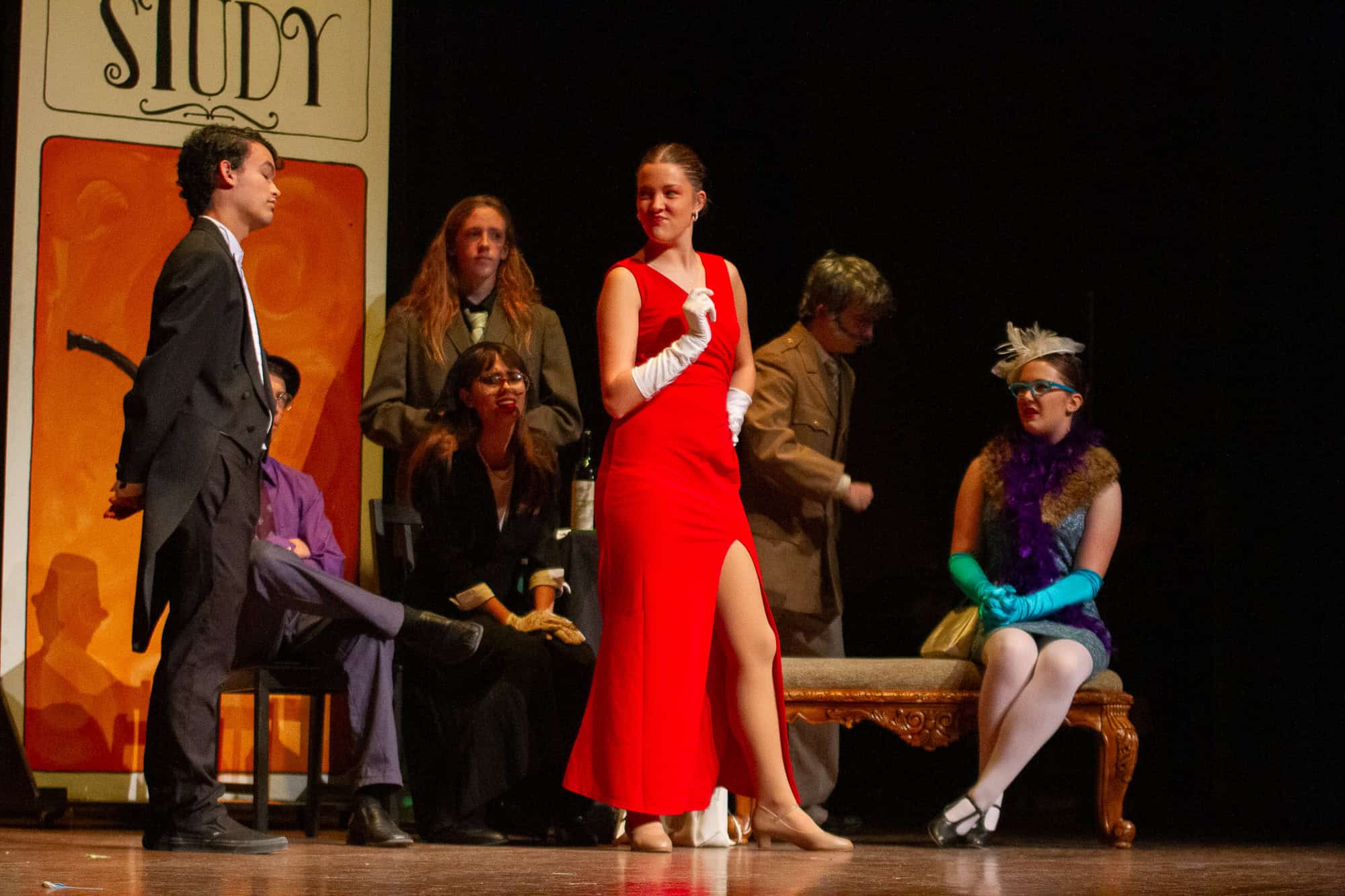 Woman in Red Dress with look on her f ace.