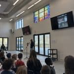 Students listen to Zac Nafziger '94 talk about his process with "The Forrest Leafy Light" 